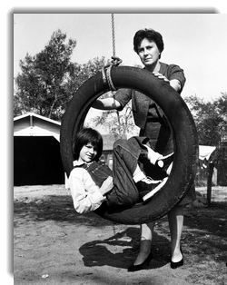 Scout in a swing from movie version of To Kill a Mockingbird